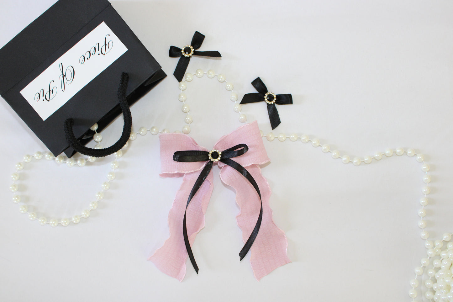 Upper east icon bow