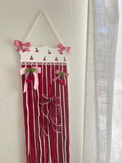 The cherry yarn bow holder