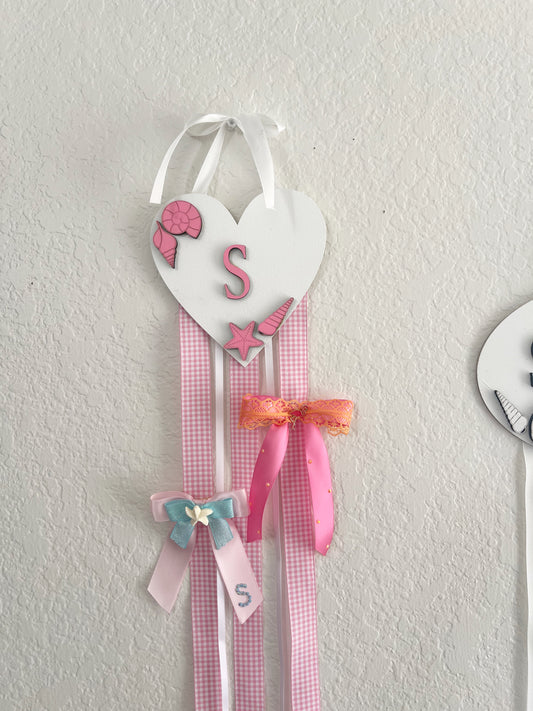 The pink coastal bow holder